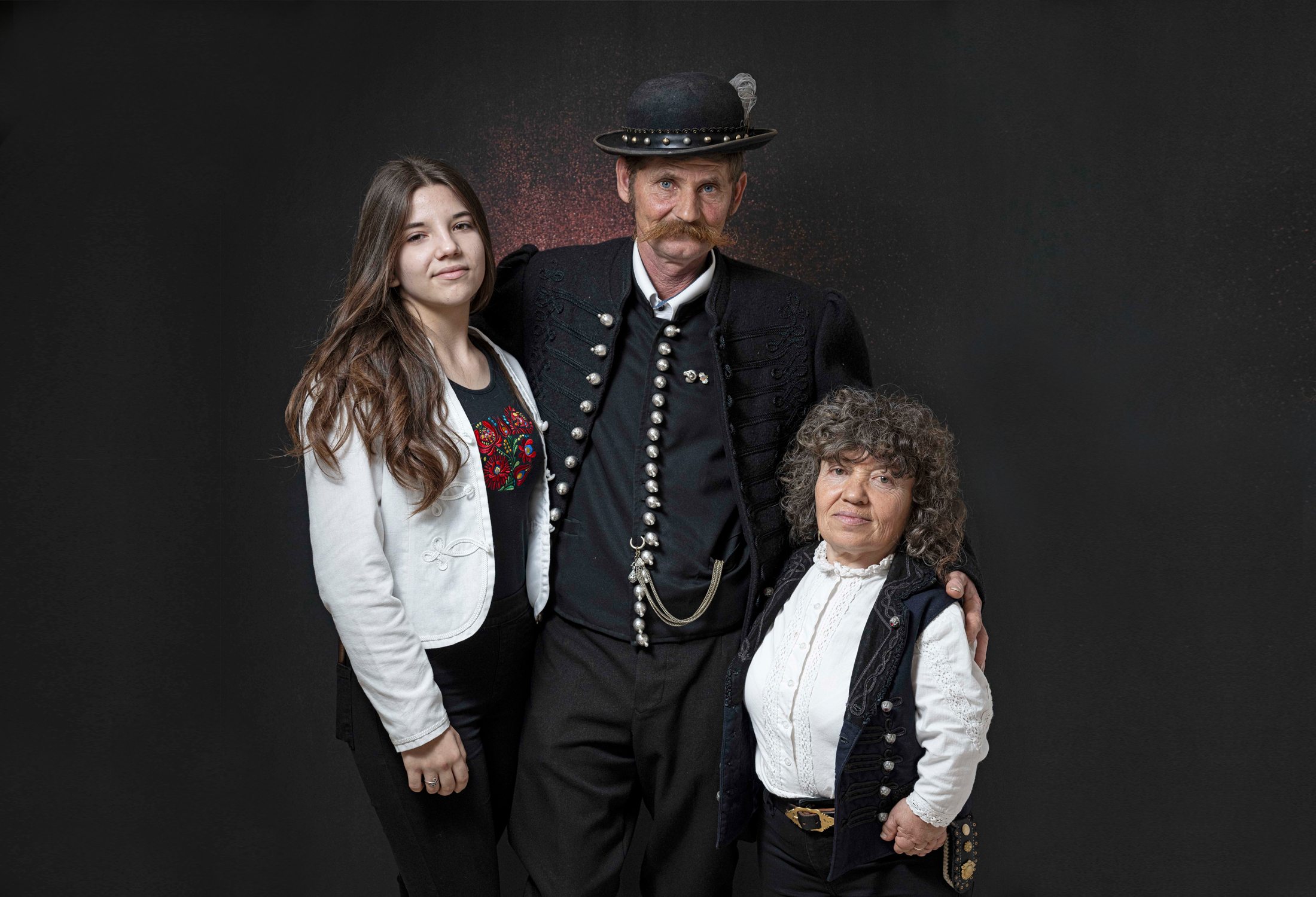 László Sáfián with his wife and daughter in traditional shepherd attire